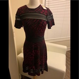 New MK flounce plum print dress w/cutout detail